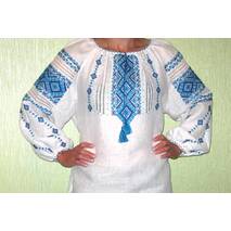 Damska haftowana koszula, ozdobiona niebieskim ornamentem