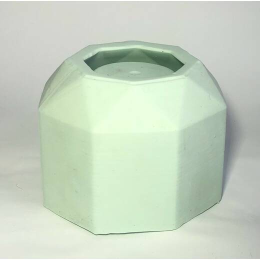 Kula. Silikonowy kształt kubka wykonany z gipsu, cementu, parafiny.